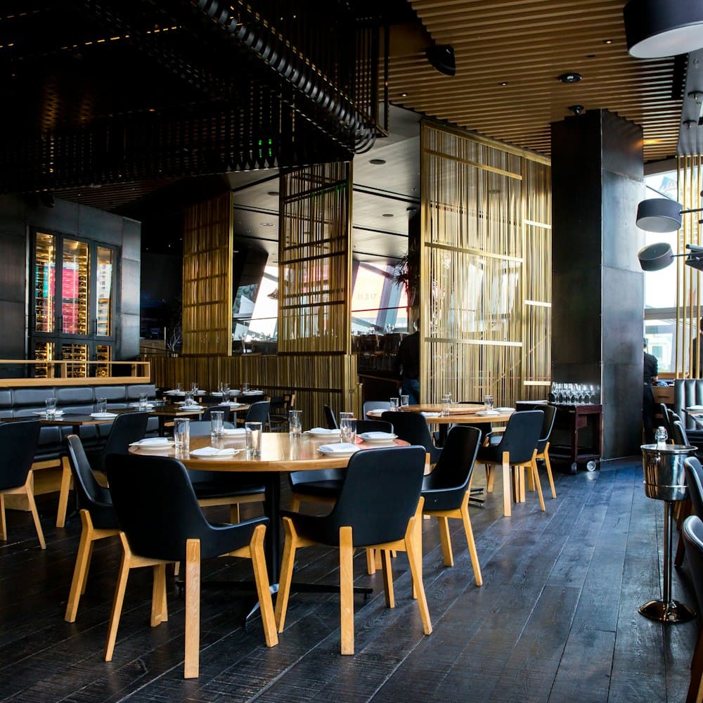 Restaurant dining room set for reserved guests